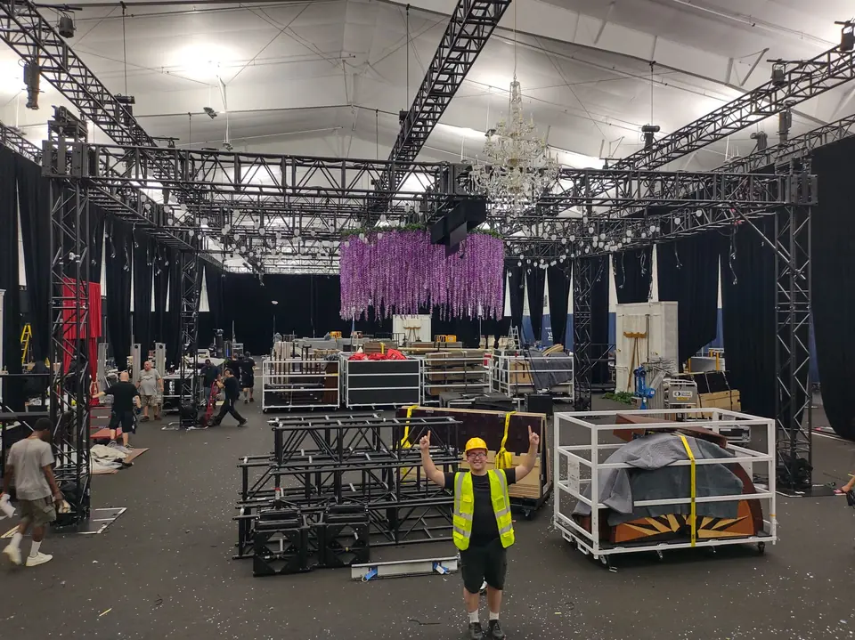 The Queen's Ball during load-in: truss, road cases and the set under construction